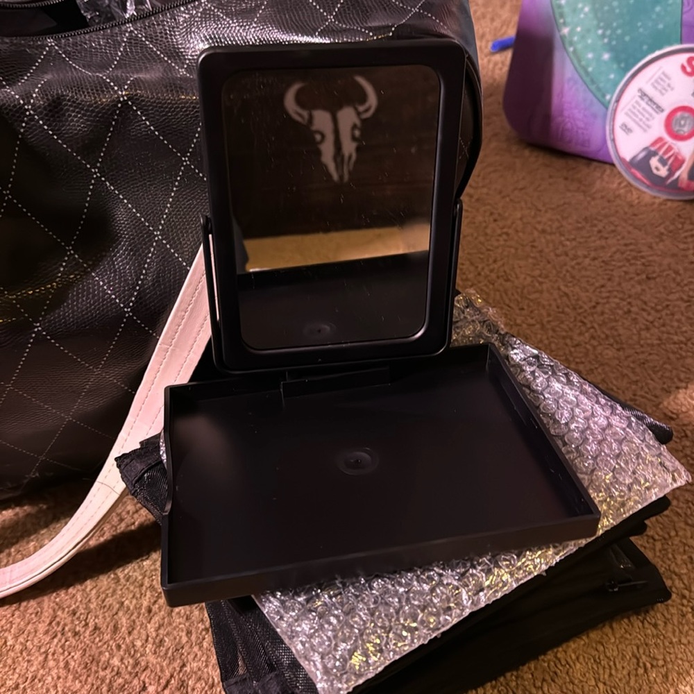 4 Mary Kay mirrors